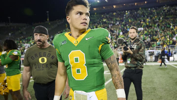 Nov 9, 2024; Eugene, Oregon, USA; Oregon Ducks quarterback Dillon Gabriel (8) walks off the field after a game against the Maryland Terrapins at Autzen Stadium.