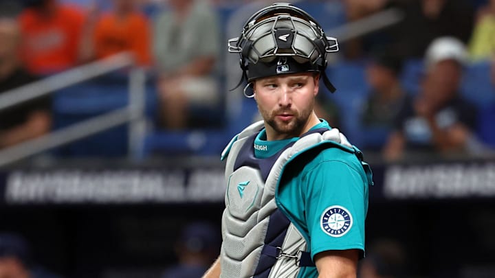 Seattle Mariners catcher Cal Raleigh looks on during a game against the Tampa Bay Rays last week at Tropicana Field in St. Petersburg, Fla. Seattle Mariners catcher Cal Raleigh looks on during a game against the Tampa Bay Rays last week at Tropicana Field in St. Petersburg, Fla.