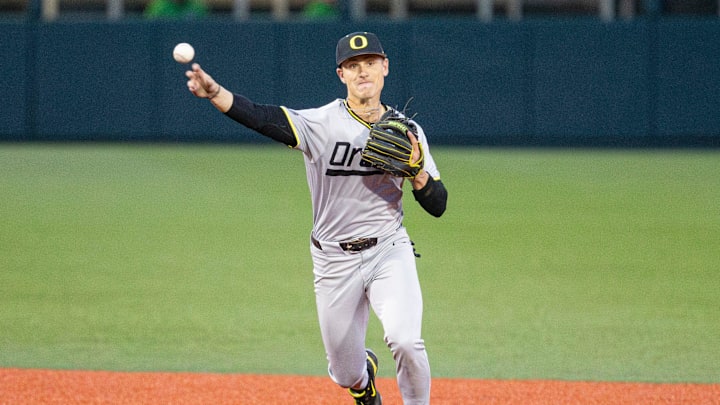 Oregon's Maddox Molony (9) throws the ball to first base duringÊthe NCAA college baseball game at Goss Stadium on Friday, April 26, 2024, in Corvallis, Ore.