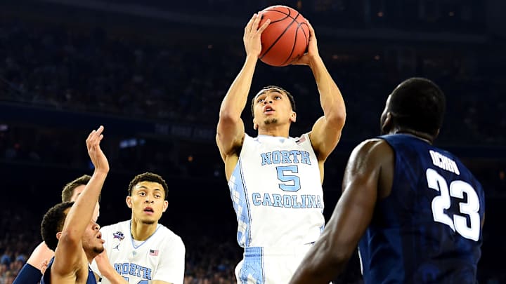 Apr 4, 2016; Houston, TX, USA; North Carolina Tar Heels guard Marcus Paige (5) shoots the ball against Villanova Wildcats forward Daniel Ochefu (23) during the first half in the championship game of the 2016 NCAA Men's Final Four at NRG Stadium. Mandatory Credit: Bob Donnan-Imagn Images