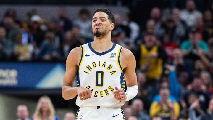 Mar 4, 2025; Indianapolis, Indiana, USA; Indiana Pacers guard Tyrese Haliburton (0) celebrates a made basket  in the second half against the Houston Rockets at Gainbridge Fieldhouse. Mandatory Credit: Trevor Ruszkowski-Imagn Images