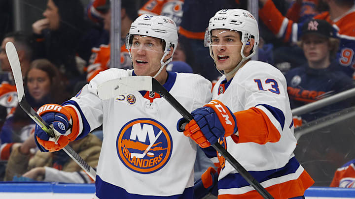 Jan 5, 2023; Edmonton, Alberta, CAN; The New York Islanders celebrate a goal scored by forward Matt Barzal (13) during the second period against Edmonton Oilers at Rogers Place. Mandatory Credit: Perry Nelson-Imagn Images