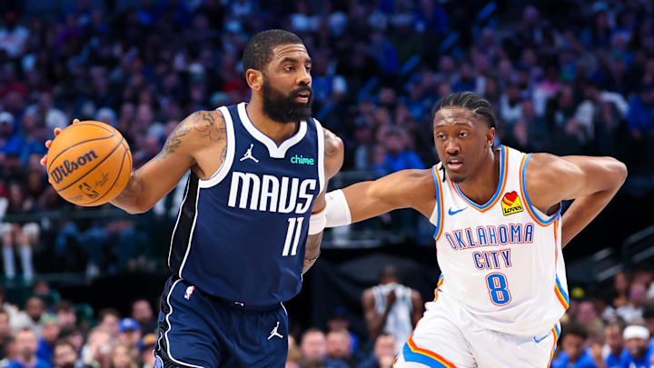 Feb 10, 2024; Dallas, Texas, USA; Dallas Mavericks guard Kyrie Irving (11) dribbles as Oklahoma City Thunder forward Jalen Williams (8) defends during the second half at American Airlines Center. Mandatory Credit: Kevin Jairaj-Imagn Images Feb 10, 2024; Dallas, Texas, USA; Dallas Mavericks guard Kyrie Irving (11) dribbles as Oklahoma City Thunder forward Jalen Williams (8) defends during the second half at American Airlines Center. Mandatory Credit: Kevin Jairaj-Imagn Images