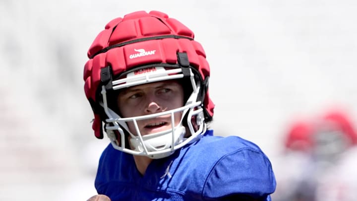 Oklahoma's John Mateer looks to throw a pass during the University of Oklahoma Sooners Crimson Combine at Gaylord Family - Oklahoma Memorial Stadium in Norman, Okla., Saturday, April, 12, 2025.