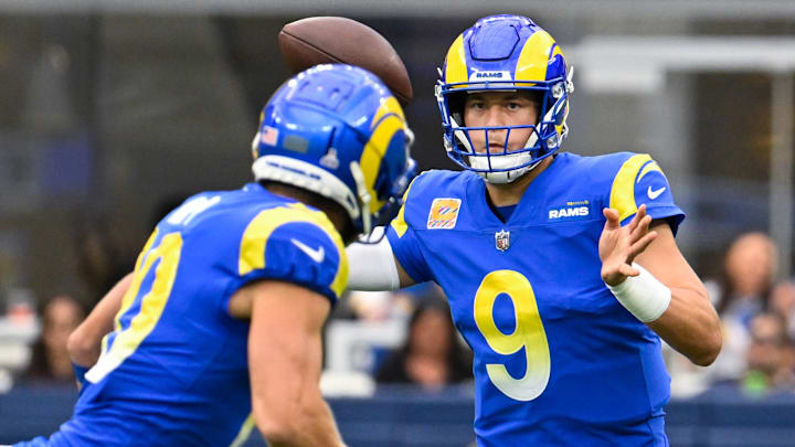 Oct 16, 2022; Inglewood, California, USA; Los Angeles Rams quarterback Matthew Stafford (9) looks to pass the ball to wide receiver Cooper Kupp (10) during the first quarter against the Carolina Panthers at SoFi Stadium. Mandatory Credit: Robert Hanashiro-Imagn Images Oct 16, 2022; Inglewood, California, USA; Los Angeles Rams quarterback Matthew Stafford (9) looks to pass the ball to wide receiver Cooper Kupp (10) during the first quarter against the Carolina Panthers at SoFi Stadium. Mandatory Credit: Robert Hanashiro-Imagn Images