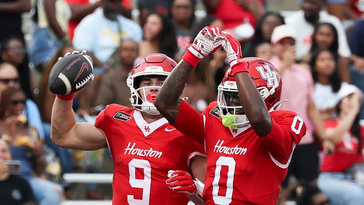 Sep 12, 2026; Houston, Texas, USA; Houston Cougars tight end Patrick Overmyer (9) celebrates with wide receiver Amare Thomas (0) after scoring a touchdown during the first quarter against the Southern University Jaguars at TDECU Stadium. Mandatory Credit: Troy Taormina-Imagn Images Sep 12, 2026; Houston, Texas, USA; Houston Cougars tight end Patrick Overmyer (9) celebrates with wide receiver Amare Thomas (0) after scoring a touchdown during the first quarter against the Southern University Jaguars at TDECU Stadium. Mandatory Credit: Troy Taormina-Imagn Images