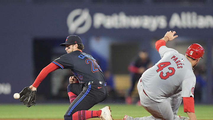 St. Louis Cardinals catcher Pedro Pages (43) steals second base against Toronto Blue Jays shortstop Ernie Clement (28) during the 8th inning at Rogers Centre on Sept 13.