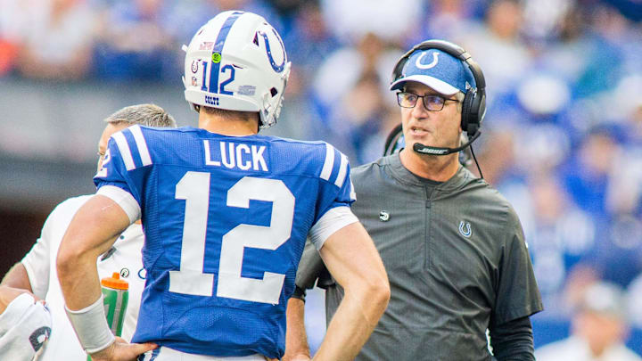 Sep 30, 2018; Indianapolis, IN, USA; Indianapolis Colts head coach Frank Reich and quarterback Andrew Luck (12) talk during a timeout in the second half against the Houston Texans  at Lucas Oil Stadium. Mandatory Credit: Trevor Ruszkowski-Imagn Images