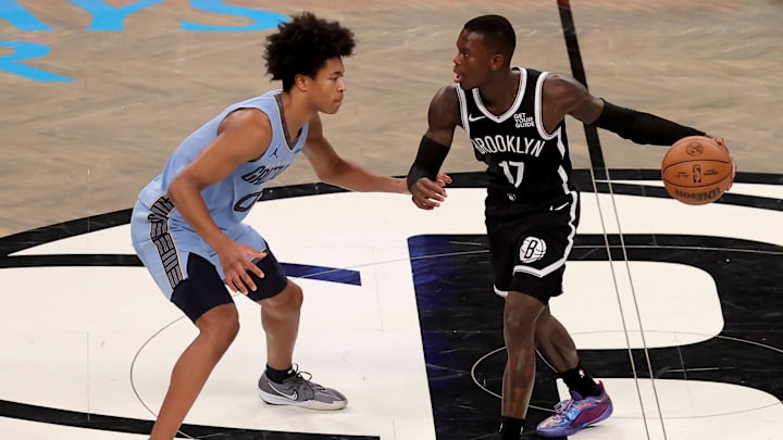 Nov 4, 2024; Brooklyn, New York, USA; Brooklyn Nets guard Dennis Schroder (17) controls the ball against Memphis Grizzlies forward Jaylen Wells (0) during the fourth quarter at Barclays Center. Mandatory Credit: Brad Penner-Imagn Images