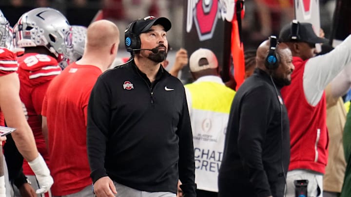 Ohio State Buckeyes head coach Ryan Day looks to the scoreboard during the Cotton Bowl at AT&T Stadium in Arlington, Texas for the College Football Playoff quarterfinal game against the Miami Hurricanes on Dec. 31, 2025. Ohio State Buckeyes head coach Ryan Day looks to the scoreboard during the Cotton Bowl at AT&T Stadium in Arlington, Texas for the College Football Playoff quarterfinal game against the Miami Hurricanes on Dec. 31, 2025.