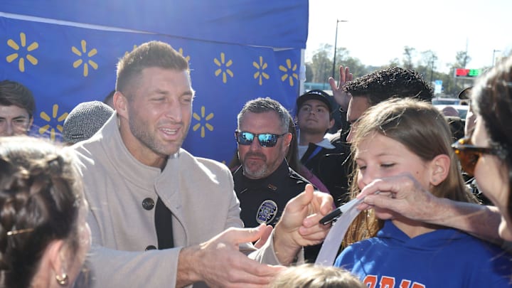 Former University of Florida football player and Heisman Trophy winner Tim Tebow makes a guest appearance on Jan. 28, 2026, at the grand opening for the Walmart Neighborhood Market at 3535 SE Maricamp Road in Ocala.