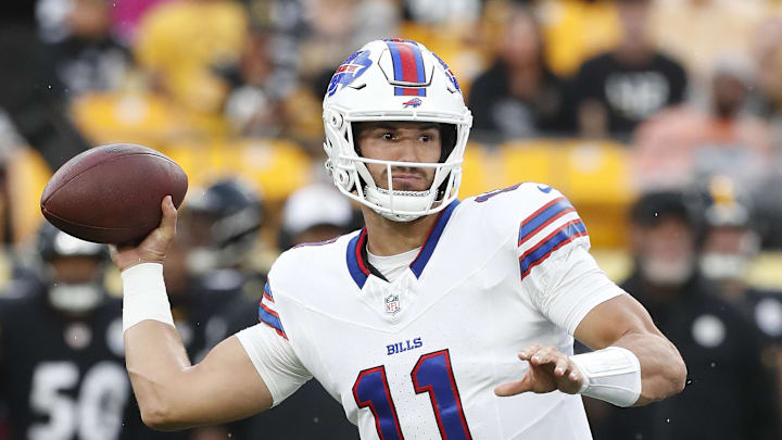 Aug 17, 2024; Pittsburgh, Pennsylvania, USA;  Buffalo Bills quarterback Mitchell Trubisky (11) passes against the Pittsburgh Steelers