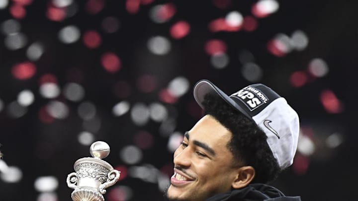 Dec 31, 2022; New Orleans, LA, USA;  Alabama quarterback Bryce Young (9) carries away the MVP trophy