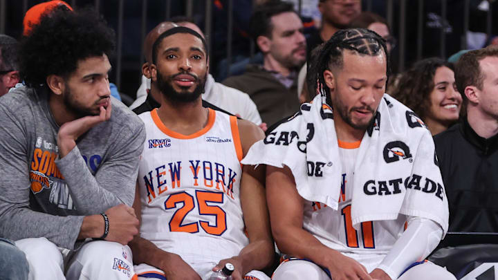 Jan 17, 2025; New York, New York, USA;  New York Knicks forwards Jacob Toppin (00), Mikal Bridges (25) and guard Jalen Brunson (11) at Madison Square Garden. Mandatory Credit: Wendell Cruz-Imagn Images