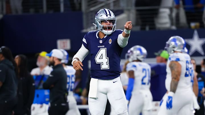 Dallas Cowboys quarterback Dak Prescott reacts after throwing a touchdown pass during the first half against the Detroit Lions 