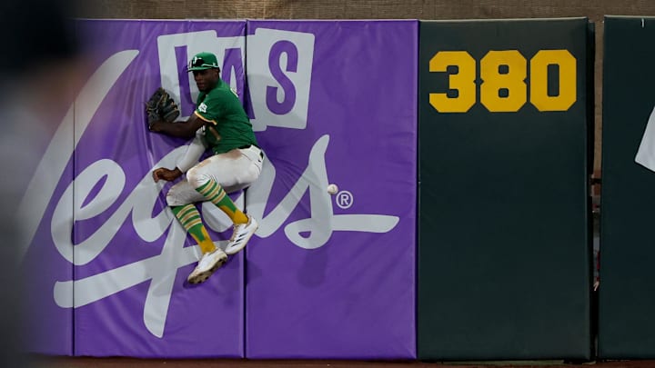 Jun 3, 2025; West Sacramento, California, USA; Athletics center fielder Denzel Clarke (1) comes up short of the ball hit by Minnesota Twins third baseman Royce Lewis (not pictured) during the seventh inning at Sutter Health Park. Mandatory Credit: Dennis Lee-Imagn Images Jun 3, 2025; West Sacramento, California, USA; Athletics center fielder Denzel Clarke (1) comes up short of the ball hit by Minnesota Twins third baseman Royce Lewis (not pictured) during the seventh inning at Sutter Health Park. Mandatory Credit: Dennis Lee-Imagn Images