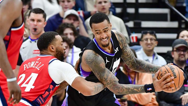 Feb 13, 2025; Salt Lake City, Utah, USA; LA Clippers guard Norman Powell (24) defends Utah Jazz forward/center John Collins (20) during the second half at the Delta Center. Mandatory Credit: Christopher Creveling-Imagn Images