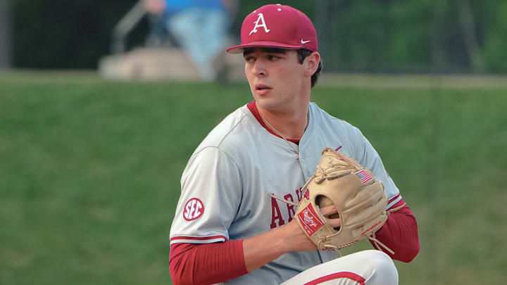 Arkansas Razorbacks pitcher Hunter Dietz warming up before an inning against the Kentucky Wildcats.