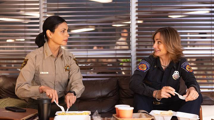 “Death & Taxes” – Pictured: Morena Baccarin as Sheriff Mickey Fox and Diane Farr as Sharon. Photo: Darren Goldstein/CBS ©2025 CBS Broadcasting, Inc. All Rights Reserved. “Death & Taxes” – Pictured: Morena Baccarin as Sheriff Mickey Fox and Diane Farr as Sharon. Photo: Darren Goldstein/CBS ©2025 CBS Broadcasting, Inc. All Rights Reserved.