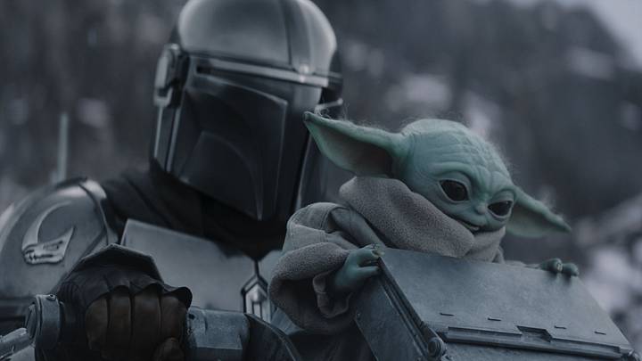 (L-R) The Mandalorian and Grogu in Lucasfilm's THE MANDALORIAN AND GROGU. Photo courtesy of Lucasfilm. © 2026 Lucasfilm Ltd™. All Rights Reserved.