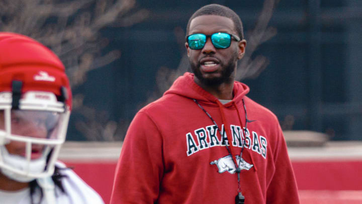 Arkansas Razorbacks wide receivers coach Larry Smith during spring practice drills.