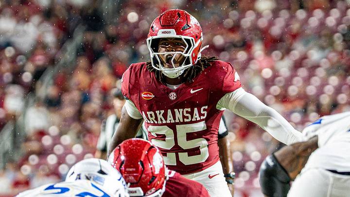 Arkansas Razorbacks linebacker JQ Smith surveys Tulsa offense before a snap in the first half. Arkansas Razorbacks linebacker JQ Smith surveys Tulsa offense before a snap in the first half.