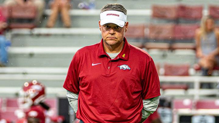 Arkansas Razorbacks offensive coordinator Tim Cramsey observes his unit during pregame warmups against Tulsa. Arkansas Razorbacks offensive coordinator Tim Cramsey observes his unit during pregame warmups against Tulsa.