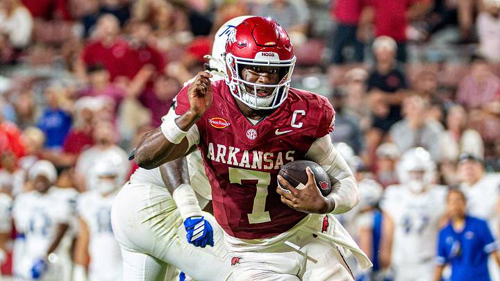 Arkansas Razorbacks quarterback KJ Jackson looks for running room during the second half against Tulsa. Arkansas Razorbacks quarterback KJ Jackson looks for running room during the second half against Tulsa.