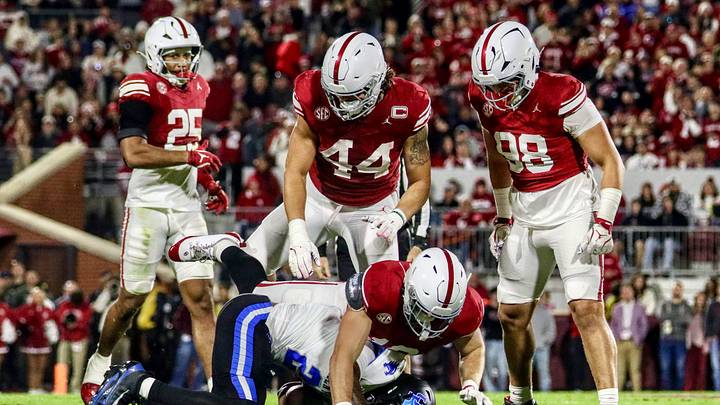 Oklahoma linebacker Cole Sullivan and defensive end Taylor Wein make a tackle against Kentucky. Oklahoma linebacker Cole Sullivan and defensive end Taylor Wein make a tackle against Kentucky.