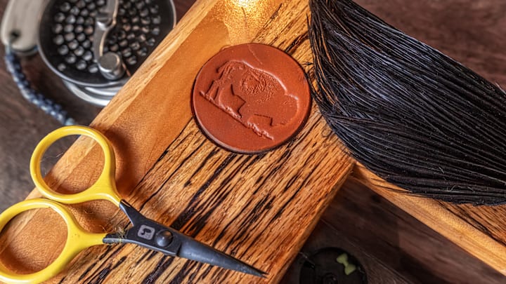 Some details of a Lone Bison fly tying table.