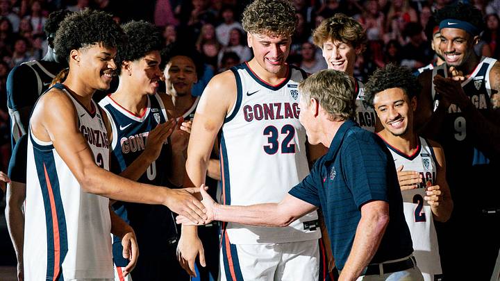 Gonzaga players smile as they interact with head coach Mark Few at Kraziness in the Kennel at McCarthey Athletic Center in Spokane, Wash.