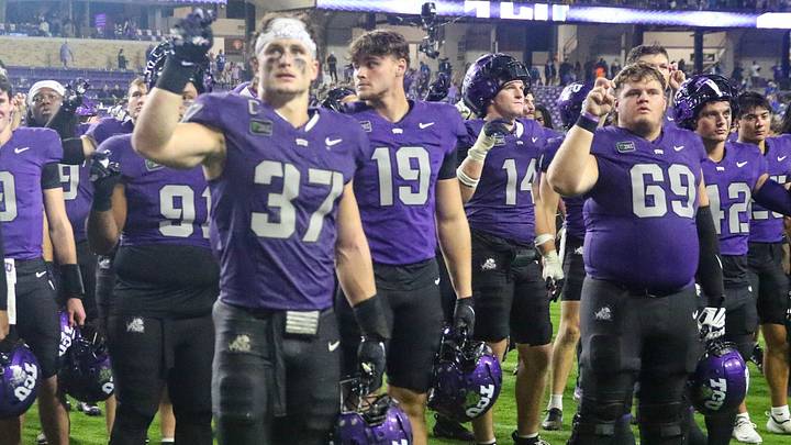 After a loss to BYU, the TCU team is gathered on the field in a somber moment, standing together in their alma mater tradition. It's a unified, reflective scene that feels steady rather than celebratory. After a loss to BYU, the TCU team is gathered on the field in a somber moment, standing together in their alma mater tradition. It's a unified, reflective scene that feels steady rather than celebratory.
