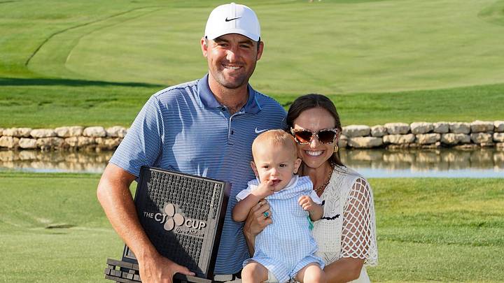 May 4, 2025; McKinney, Texas, USA; Scottie Scheffler with his wife Meredith and son Bennett pose with the winner's trophy during the final round of the THE CJ CUP Byron Nelson golf tournament. Scheffler won with a score of 31-under par for the tournament. May 4, 2025; McKinney, Texas, USA; Scottie Scheffler with his wife Meredith and son Bennett pose with the winner's trophy during the final round of the THE CJ CUP Byron Nelson golf tournament. Scheffler won with a score of 31-under par for the tournament.