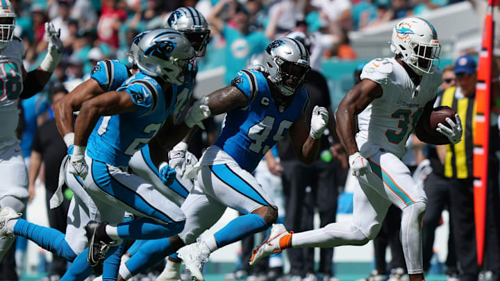 Miami Dolphins running back Raheem Mostert (31) breaks free for a big gain against the Carolina Panthers during the first half of an NFL game at Hard Rock Stadium in Miami Gardens, Oct. 15, 2023.