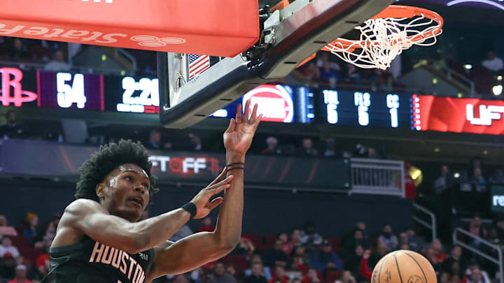 Jan 20, 2025; Houston, Texas, USA; Houston Rockets forward Amen Thompson (1) dunks against the Detroit Pistons in the second quarter at Toyota Center. Mandatory Credit: Thomas Shea-Imagn Images