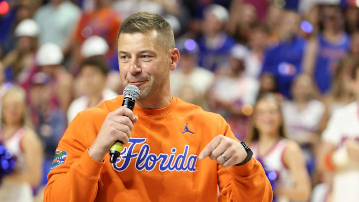 New Gator head football coach Jon Sumrall fires up the crowd during the first half an NCAA basketball game at Steven C. O'Connell Center Exactek arena in Gainesville, FL on Saturday, January 24, 2026. Auburn won 76-67 [Alan Youngblood/Gainesville Sun]