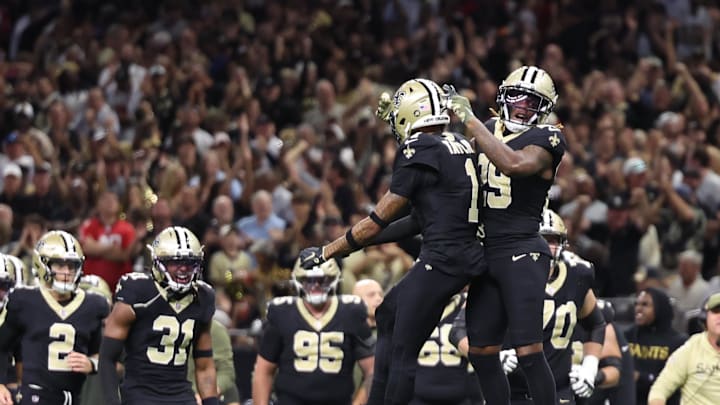 Oct 26, 2025; New Orleans, Louisiana, USA; New Orleans Saints cornerback Alontae Taylor (1) and cornerback Quincy Riley (29) react during the first quarter against the Tampa Bay Buccaneers  at Caesars Superdome. Mandatory Credit: Stephen Lew-Imagn Images