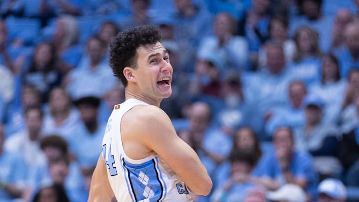 Nov 11, 2025; Chapel Hill, North Carolina, USA; North Carolina Tar Heels guard Luka Bogavac (44) celebrates after three point basket against the Radford Highlanders in the second half at Dean E. Smith Center. Nov 11, 2025; Chapel Hill, North Carolina, USA; North Carolina Tar Heels guard Luka Bogavac (44) celebrates after three point basket against the Radford Highlanders in the second half at Dean E. Smith Center.