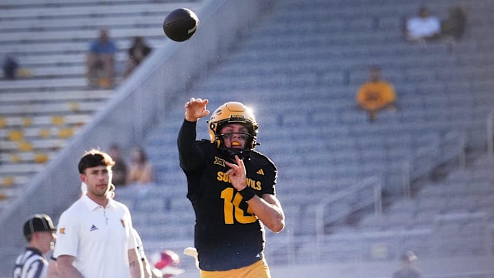 ASU Sun Devils quarterback Sam Leavitt (10) warms up before the game against the Houston Cougars at Mountain America Stadium in Tempe on Oct. 25, 2025.