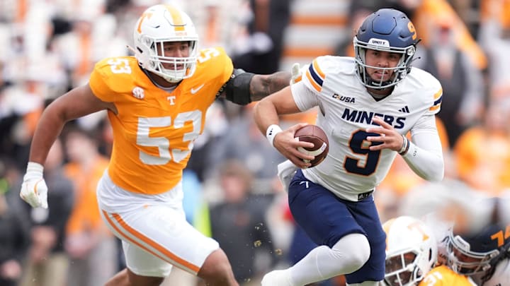Nov 23, 2024; Knoxville, Tennessee, USA; UTEP Miners quarterback Skyler Locklear (9) is pressured by Tennessee Volunteers defensive lineman Daevin Hobbs (53) during the first half at Neyland Stadium. Mandatory Credit: Brianna Paciorka/USA TODAY Network via Imagn Images