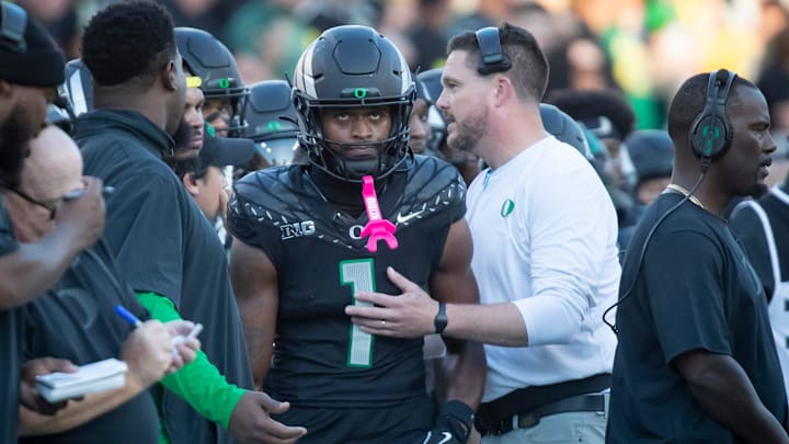 Oregon Ducks head coach Dan Lanning and Oregon Ducks wide receiver Traeshon Holden as Holden is ejected over a spitting incident as the No. 3 Oregon Ducks host the No. 2 Ohio State Buckeyes Saturday, Oct. 12, 2024 at Autzen Stadium in Eugene, Ore.