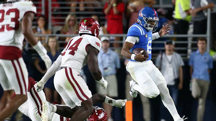 Sep 13, 2025; Oxford, Mississippi, USA; Mississippi Rebels quarterback Trinidad Chambliss (6) runs the ball during the fourth quarter against the Arkansas Razorback at Vaught-Hemingway Stadium. Mandatory Credit: Petre Thomas-Imagn Images