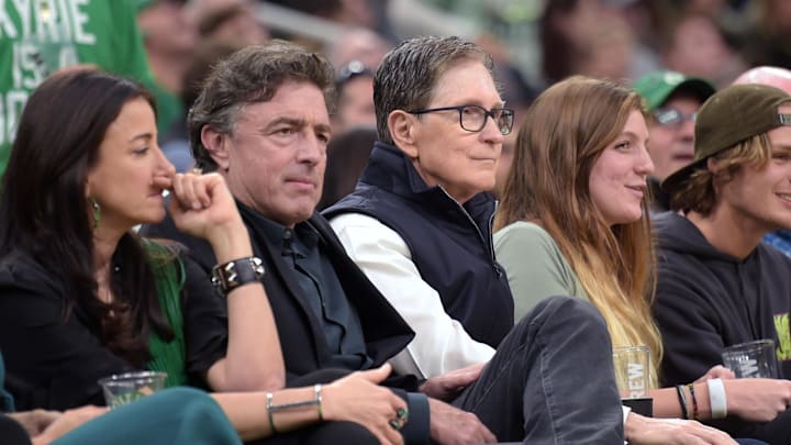 Boston Celtics owner and governor Wyc Grousbeck sits with Boston Red Sox principal owner John Henry during the first half in a game against the Toronto Raptors at TD Garden in 2019.