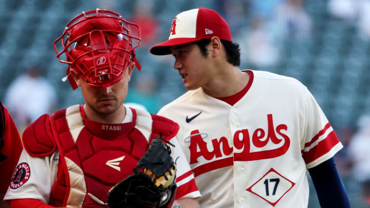 Sep 17, 2022; Anaheim, California, USA; Los Angeles Angels two-way player Shohei Ohtani (17) talks to catcher Max Stassi (33) before the game against the Seattle Mariners at Angel Stadium. Mandatory Credit: Kiyoshi Mio-USA TODAY Sports Sep 17, 2022; Anaheim, California, USA; Los Angeles Angels two-way player Shohei Ohtani (17) talks to catcher Max Stassi (33) before the game against the Seattle Mariners at Angel Stadium. Mandatory Credit: Kiyoshi Mio-USA TODAY Sports