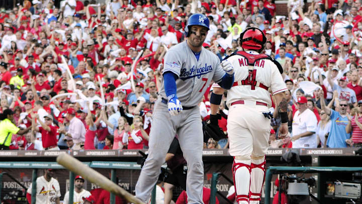 Oct 12, 2013; St. Louis, MO, USA; Los Angeles Dodgers shortstop Nick Punto (7) throws his bat after striking out against the St. Louis Cardinals during the 5th inning in game two of the National League Championship Series baseball game at Busch Stadium. Mandatory Credit: Jeff Curry-Imagn Images Oct 12, 2013; St. Louis, MO, USA; Los Angeles Dodgers shortstop Nick Punto (7) throws his bat after striking out against the St. Louis Cardinals during the 5th inning in game two of the National League Championship Series baseball game at Busch Stadium. Mandatory Credit: Jeff Curry-Imagn Images