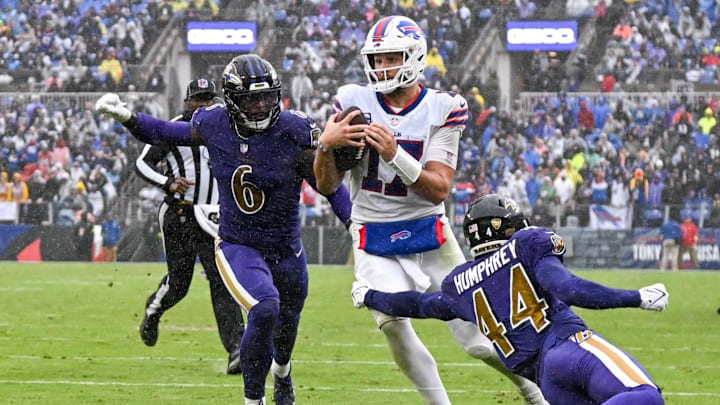 Oct 2, 2022; Baltimore, Maryland, USA; Buffalo Bills quarterback Josh Allen (17) cuts through Baltimore Ravens cornerback Marlon Humphrey (44) and linebacker Patrick Queen (6) for a third quarter touchdown at M&T Bank Stadium. Mandatory Credit: Tommy Gilligan-USA TODAY Sports Oct 2, 2022; Baltimore, Maryland, USA; Buffalo Bills quarterback Josh Allen (17) cuts through Baltimore Ravens cornerback Marlon Humphrey (44) and linebacker Patrick Queen (6) for a third quarter touchdown at M&T Bank Stadium. Mandatory Credit: Tommy Gilligan-USA TODAY Sports