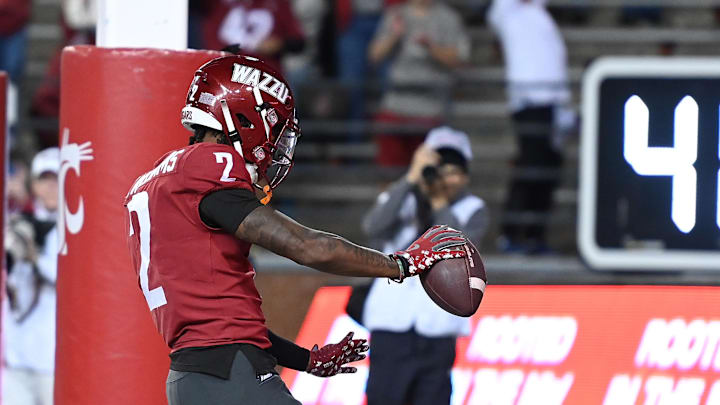 Sep 20, 2024; Pullman, Washington, USA; Washington State Cougars wide receiver Kyle Williams (2) celebrates a touchdown in the second half agains the San Jose State Spartans at Gesa Field at Martin Stadium. Washington State Cougars won 54-52 in double overtime. Mandatory Credit: James Snook-Imagn Images
