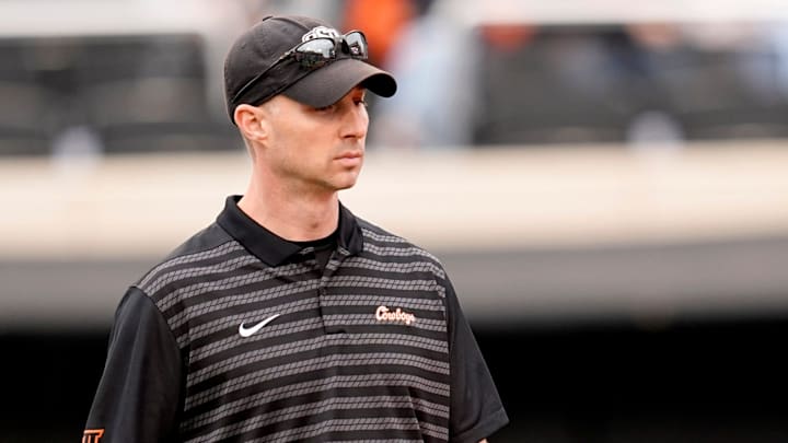 Oklahoma State Defensive Coordinator Bryan Nardo watches players warm up before the college football game between the Oklahoma State Cowboys and the Arizona State Sun Devils at Boone Pickens Stadium in Stillwater, Okla., Saturday, Nov., 2, 2024.