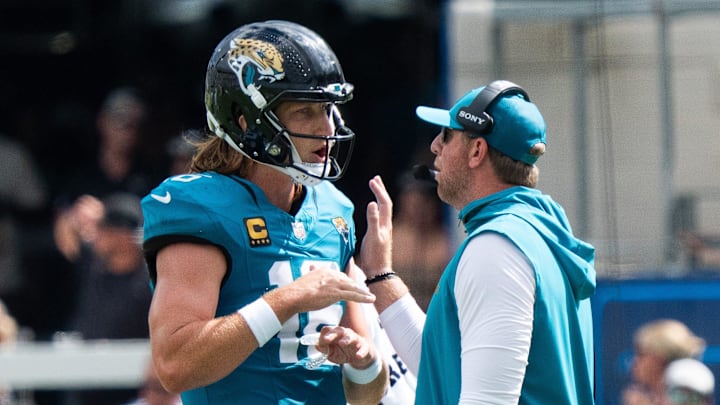 Jacksonville Jaguars quarterback Trevor Lawrence (16) and Carolina Panthers head coach Liam Coen has words during the second quarter of an NFL football game between the Carolina Panthers at Jacksonville Jaguars at EverBank Stadium Sunday September 7, 2025. [Doug Engle/Florida Times-Union]