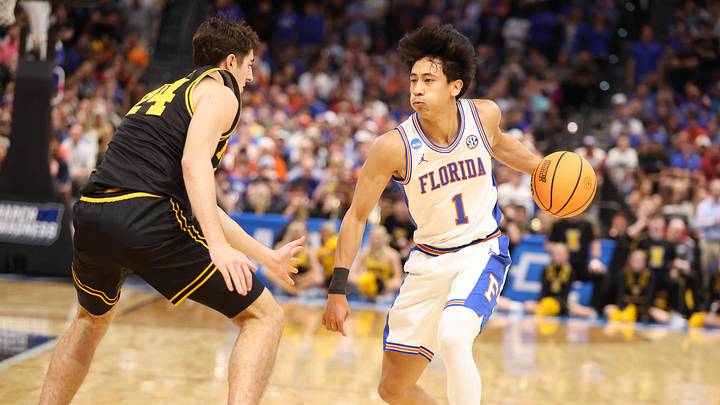 Florida guard Xaivian Lee (1) drives against Iowa guard Tate Sage (24) during the second half of the NCAA March Madness second round at Benchmark international Arena in Tampa, FL on Friday, March 20, 2026. Florida lost 73-72 [Alan Youngblood/Gainesville Sun]
